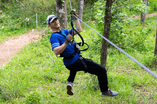 Young Adult Male On Zipline